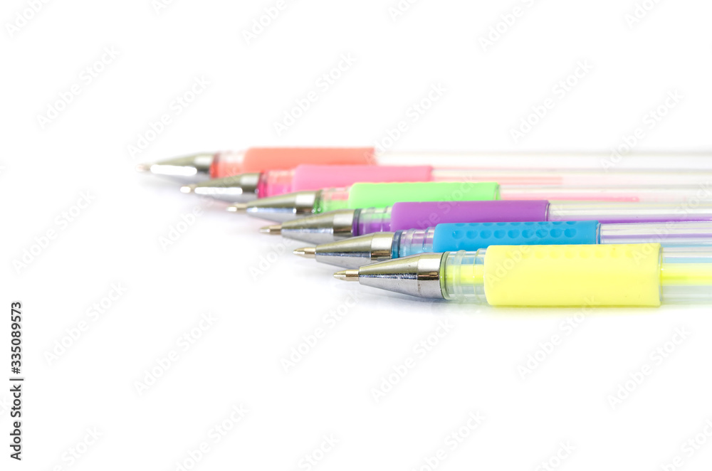 multi-colored pens on a white background. Copy space. Place for text. multi-colored pens on a white background. Copy space. Place for text.