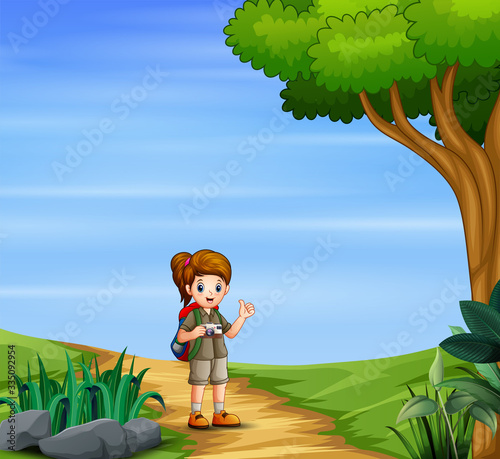 Scout girl exploring nature outside
