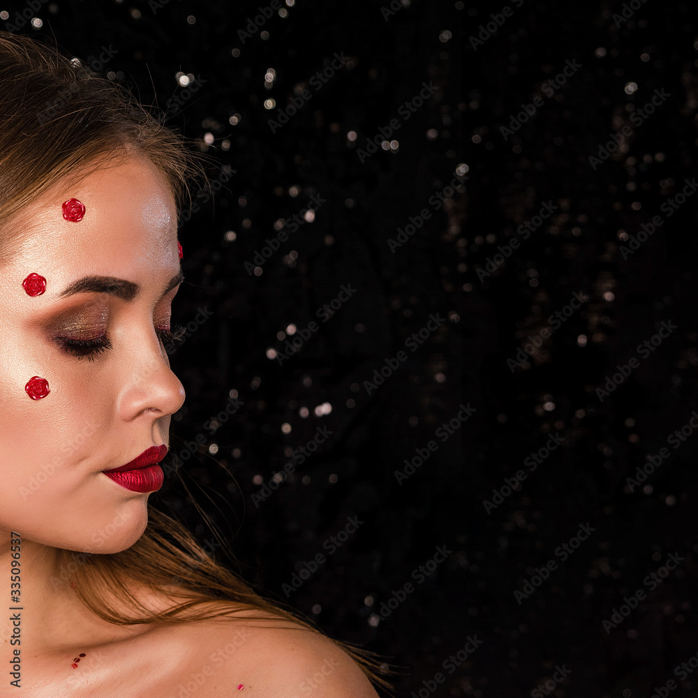 Portrait of girl with emotion on a shiny background Portrait of girl with emotion on a shiny background