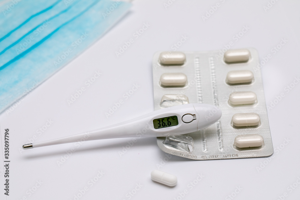 Electronic medical thermometer showing the temperature of 36.6 C. Electronic medical thermometer showing the temperature of 36.6 C.