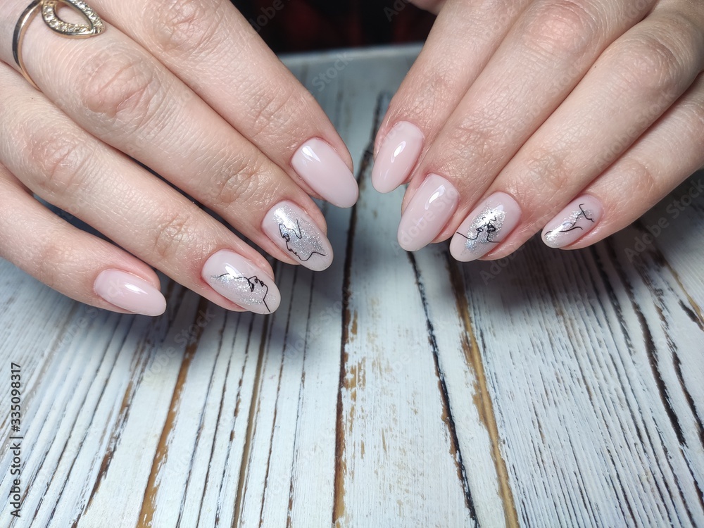 glamorous beautiful manicure on a trendy texture