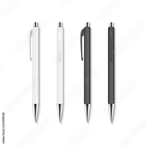 Realistic vector set of white and black automatic ballpoint pens.
