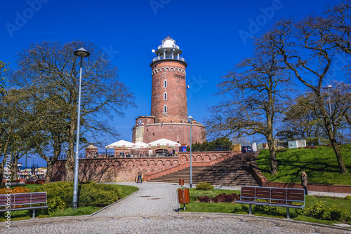 Lighthouse in Kolobrzeg coastal city over Baltic Sea, Poland photo