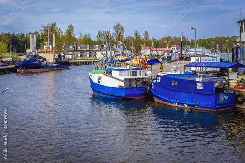 Vessels in Leba town port over Baltic Sea, Poland