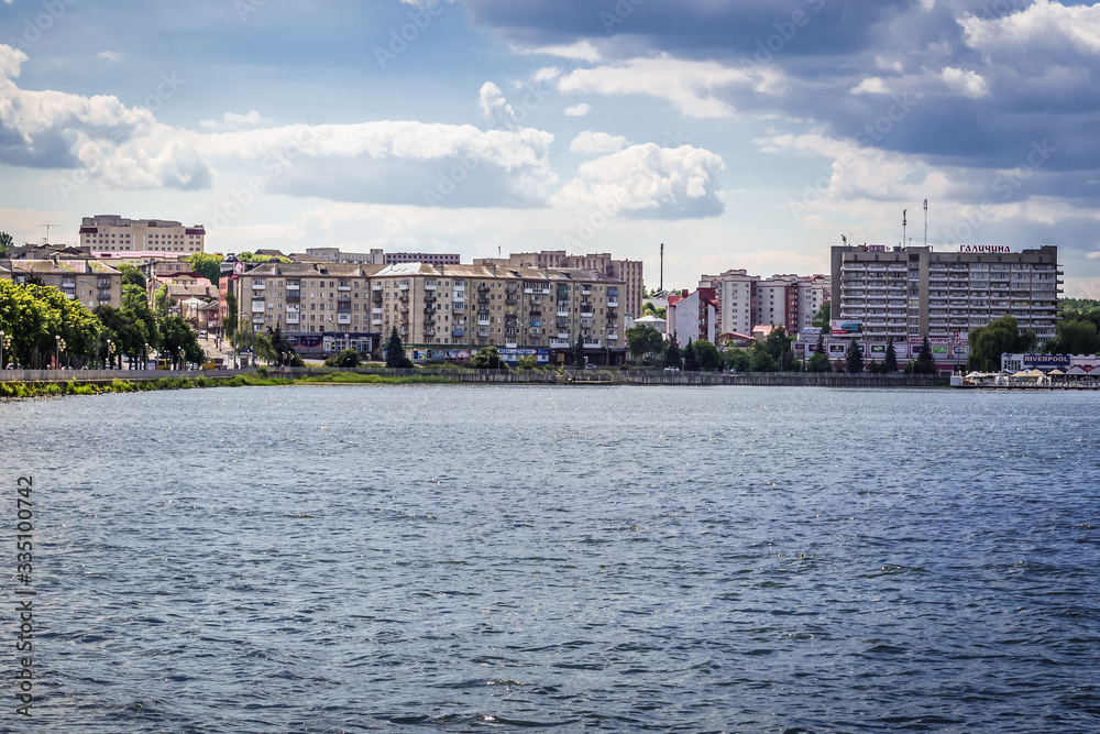 View from Park of Taras Shevchenko with buildings over lake in Ternopil, Ukraine