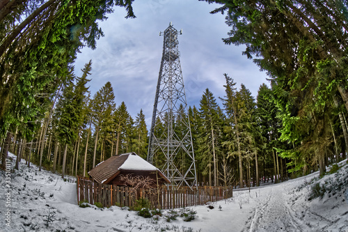 GSM tower in the winter woods