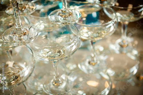 slide of clear glass glasses at a party, tableware
