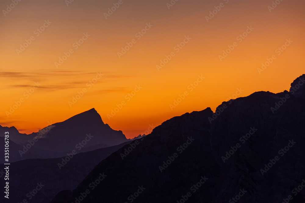 Panoramic view of the Dolomites at sunset taken from the three peaks of Lavaredo Panoramic view of the Dolomites at sunset taken from the three peaks of Lavaredo