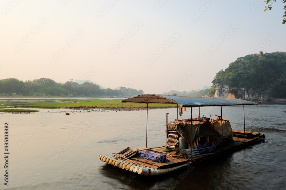 Huangbu (Yellow Cloth) Beach Sunrise on Li River, Xingping, Guilin, China. Xingping is a town in North Guangxi, China. It is 27 kilometers upstream from Yangshuo on the Li River