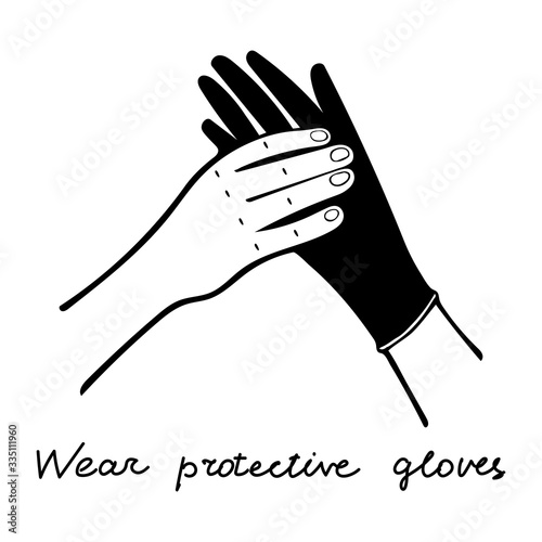 Man Putting on black Medical gloves on his hand on a white background with lettering Wear protective gloves