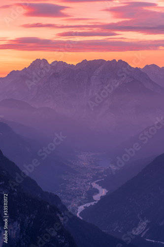 Aerial view of Cadore di Misurina photographed at sunrise. A small town famous for its lake and the nearby three peaks of Lavaredo