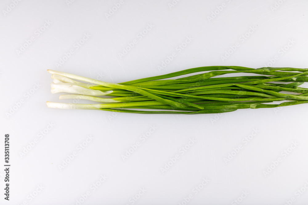 slicing green onions for a restaurant kitchen
slicing green onions for a restaurant kitchen