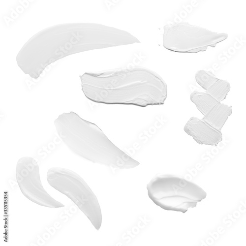 Wallpaper Mural Swabs of creamy textures. Strokes of body lotion or hand cream in different shapes and sizes. Smear of skincare cosmetics product. Cosmetology wellness and beauty concept. Isolated on white Torontodigital.ca