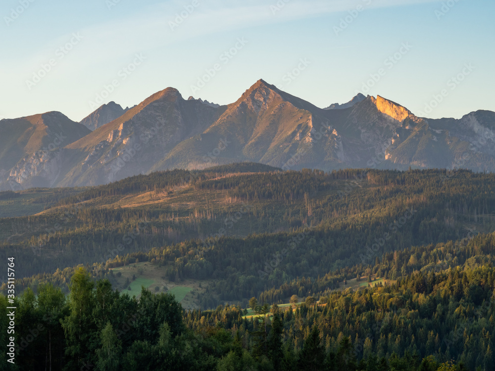 View over Tatra Mountains from Lapszanka pass, during the sunrise. Poland