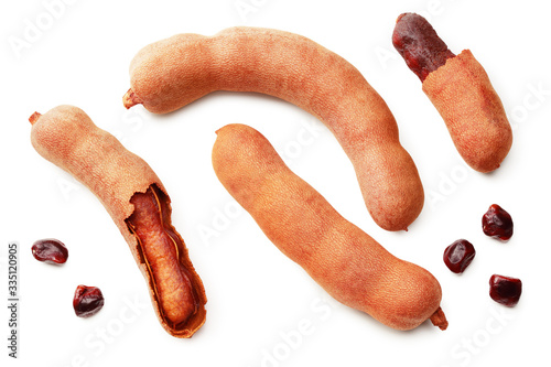Wallpaper Mural fresh tamarind fruits isolated on white background. top view Torontodigital.ca