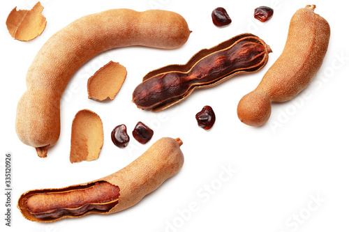 Wallpaper Mural fresh tamarind fruits isolated on white background. top view Torontodigital.ca