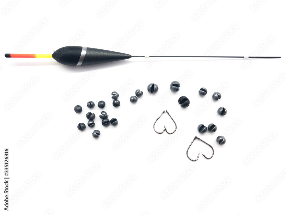 Fishing float, weights and hooks isolated on a white background. Set of fishing bobbers, weights and hooks. Set of weights for spinning. Kit of tools for professional fishing. Fishing float, weights and hooks isolated on a white background. Set of fishing bobbers, weights and hooks. Set of weights for spinning. Kit of tools for professional fishing.