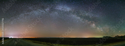 Panorama of the Milky Way Arch in the night sky in the northern hemisphere. © Дмитрий Ногаев