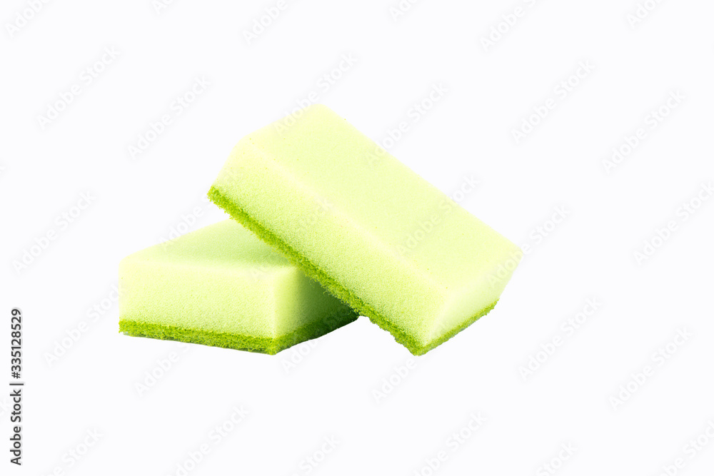 Two kitchen sponges isolated on a white background. Two kitchen sponges isolated on a white background.