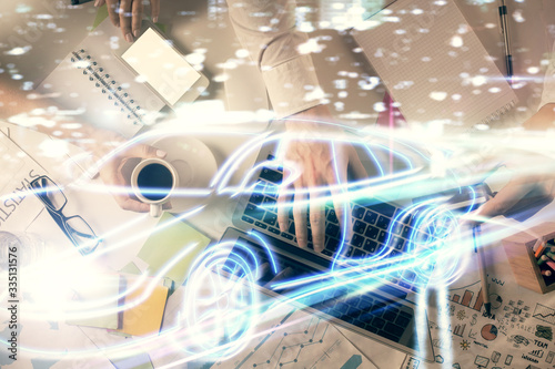 Double exposure of man and woman working together and a car drawing. Computer background. Top View. Autopilot concept.