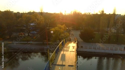 man on the bridge drone sunset video, 4k video