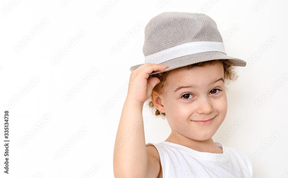 Happy boy in straw hat over white background Happy boy in straw hat over white background