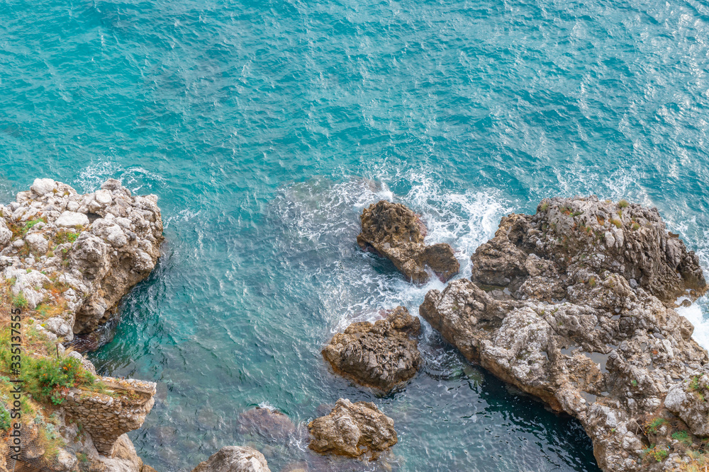 Splashing wave on the shore, Amalfi coast, Italy