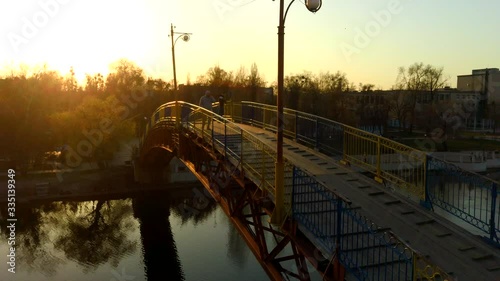 man on the bridge drone sunset video, 4k video