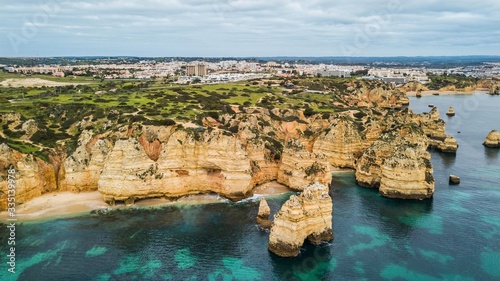 Aerial view of Balança beach, in Lagos, Algarve, Portugal. Cliff and rocks in the sea at Balança beach, Algarve region, Portugal