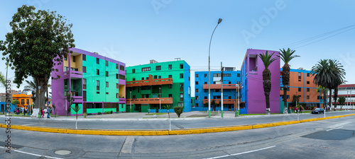 Colorful building blocks in Chucuito neighborhood in Callao Region, Peru photo