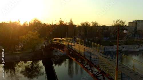 man on the bridge drone sunset video, 4k video