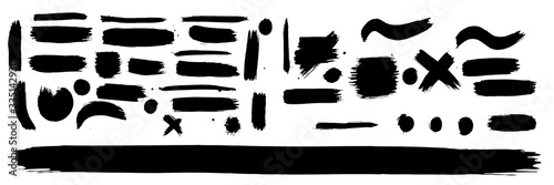 Black brush paint strokes. Texture brushes and modern grunge brush lines. Ink brush artistic design element for frame design. Vector isolated elements set. Rough smears and stains