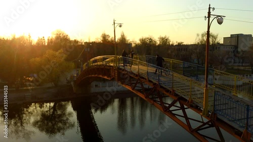 man on the bridge drone sunset video, 4k video