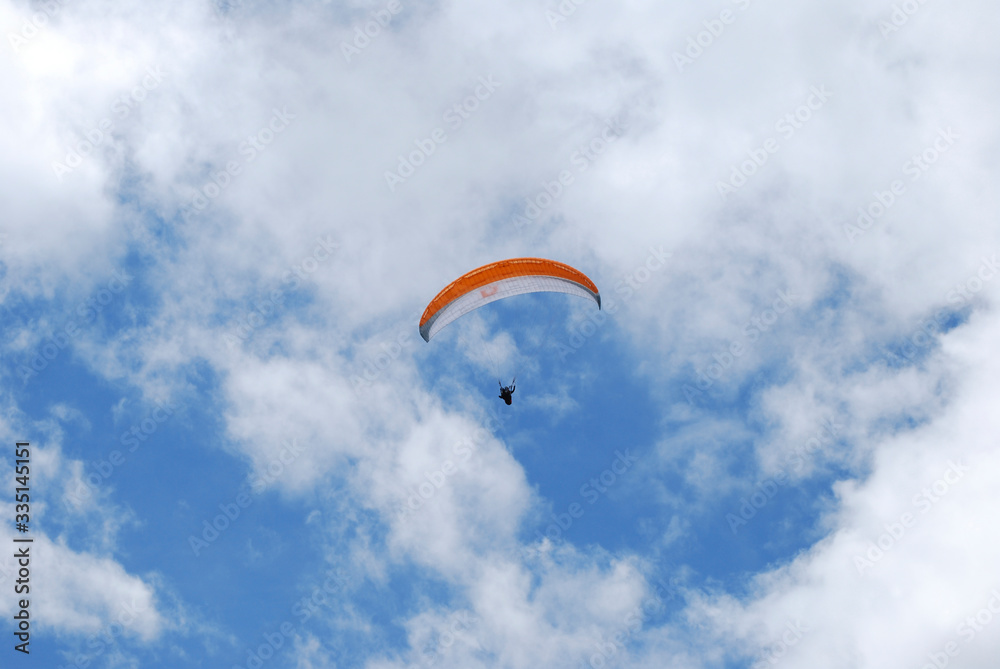 beautiful summer day for paragliding, a great experience beautiful summer day for paragliding, a great experience