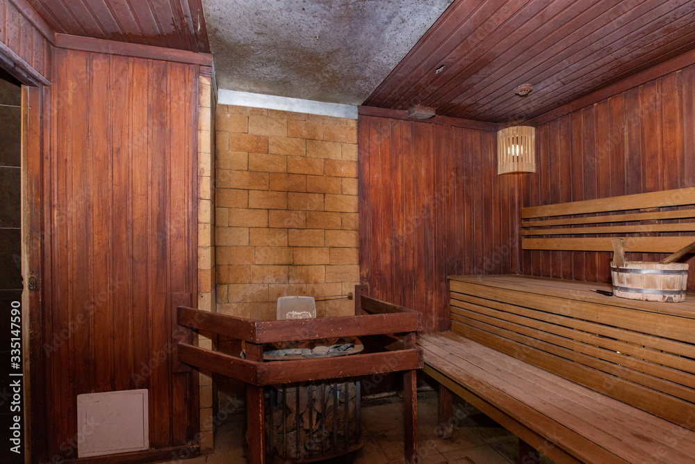 Sauna and sauna accessories on an interior background Sauna and sauna accessories on an interior background