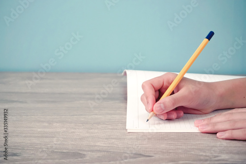 Person writing something in notebook. Class, study, household budget, memo, business, learning, etc.
ノートに何かを書いている人　授業、勉強、家計、メモ、ビジネス、学習など photo