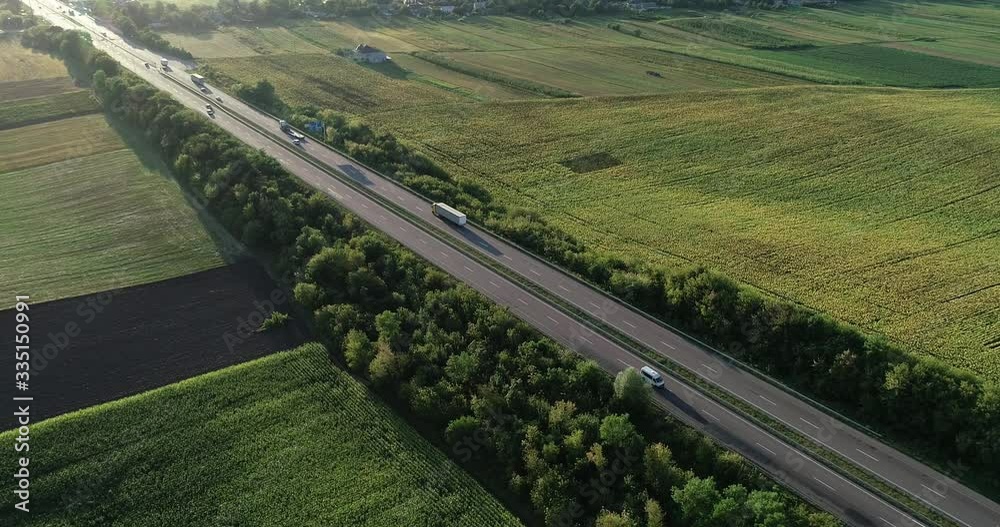 Auto Long distance route. Movement of cars. Sunny summer day