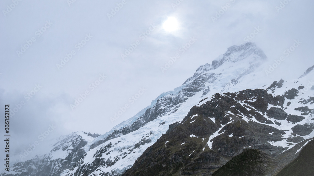 Snowstorm in mountains, on peaks of Aoraki / Mt Cook National Park in New Zealand. Snowstorm in mountains, on peaks of Aoraki / Mt Cook National Park in New Zealand.