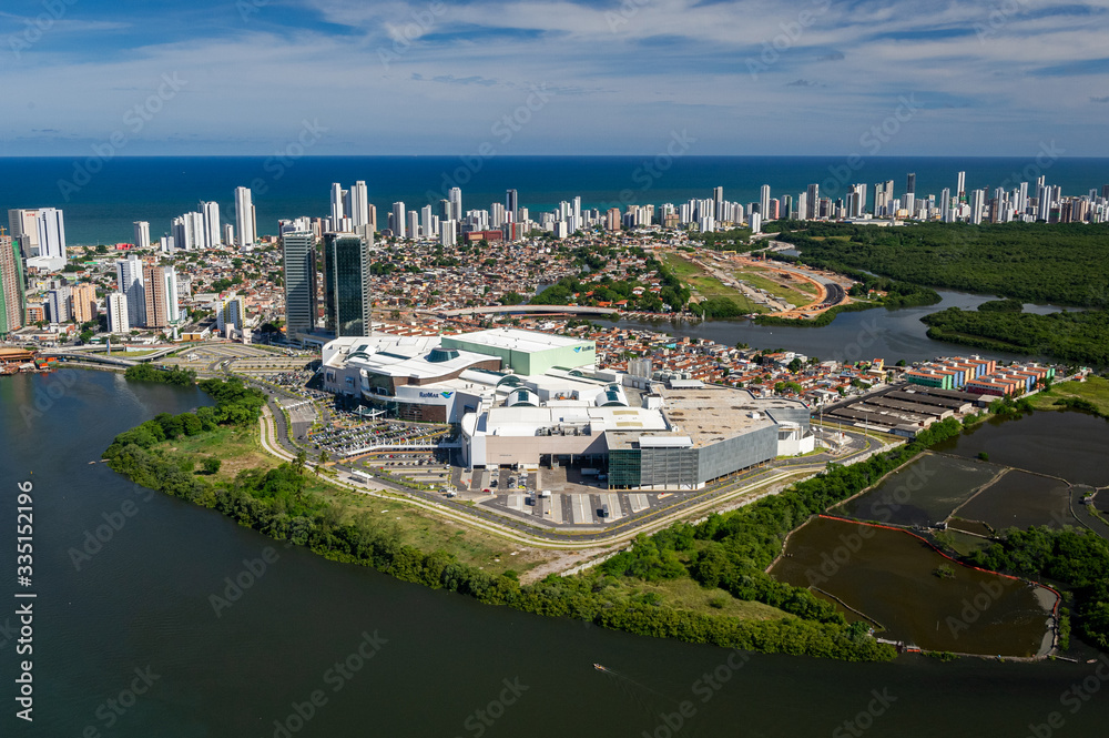 Recife city, Pernambuco, Brazil on March 1, 2014. Modern buildings in the Boa Viagem neighborhood with the beach in the background. Aerial view