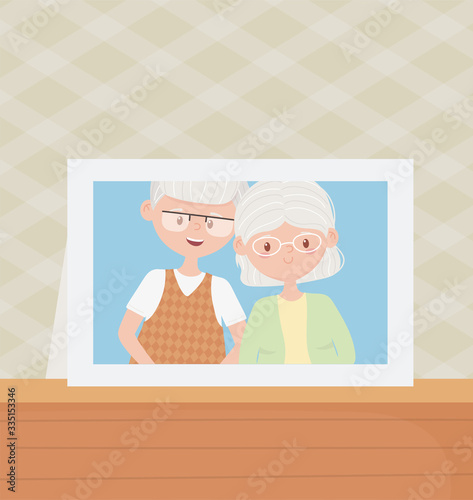 old people, cute couple grandparents photo frame in table