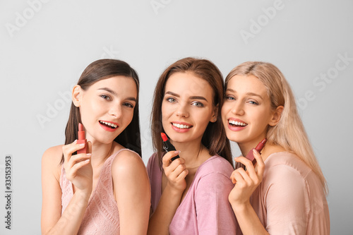 Beautiful young women apply...