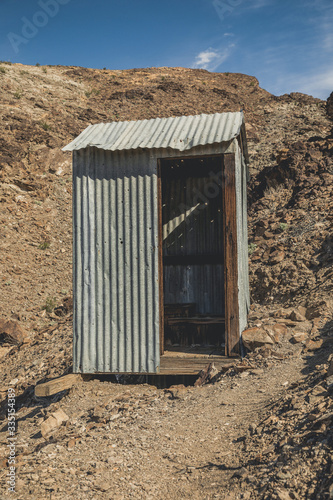 Outhouse at the Keane Wonder Mine in Death Valley National Par photo