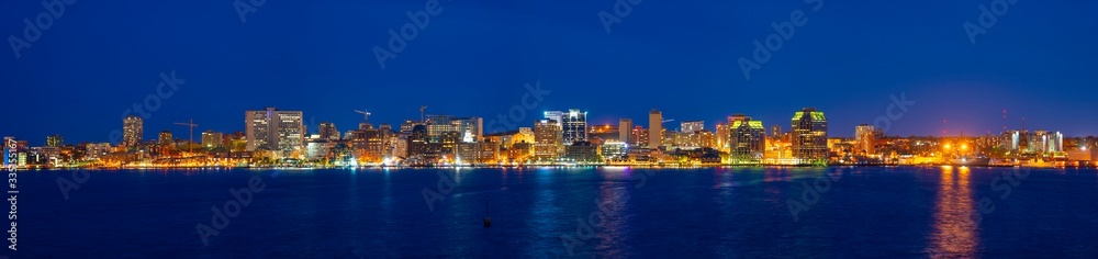 Halifax City skyline panorama at night from Dartmouth waterfront, Nova Scotia NS, Canada.