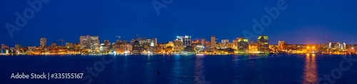 Halifax City skyline panorama at night from Dartmouth waterfront, Nova Scotia NS, Canada.