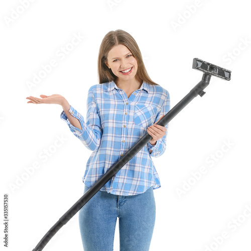 Young woman with vacuum cle...