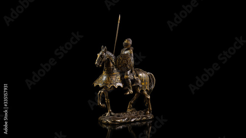 Steel statuette of a medieval knight on a warhorse