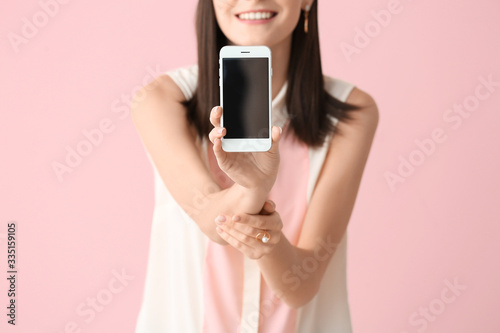 Beautiful young woman with ...