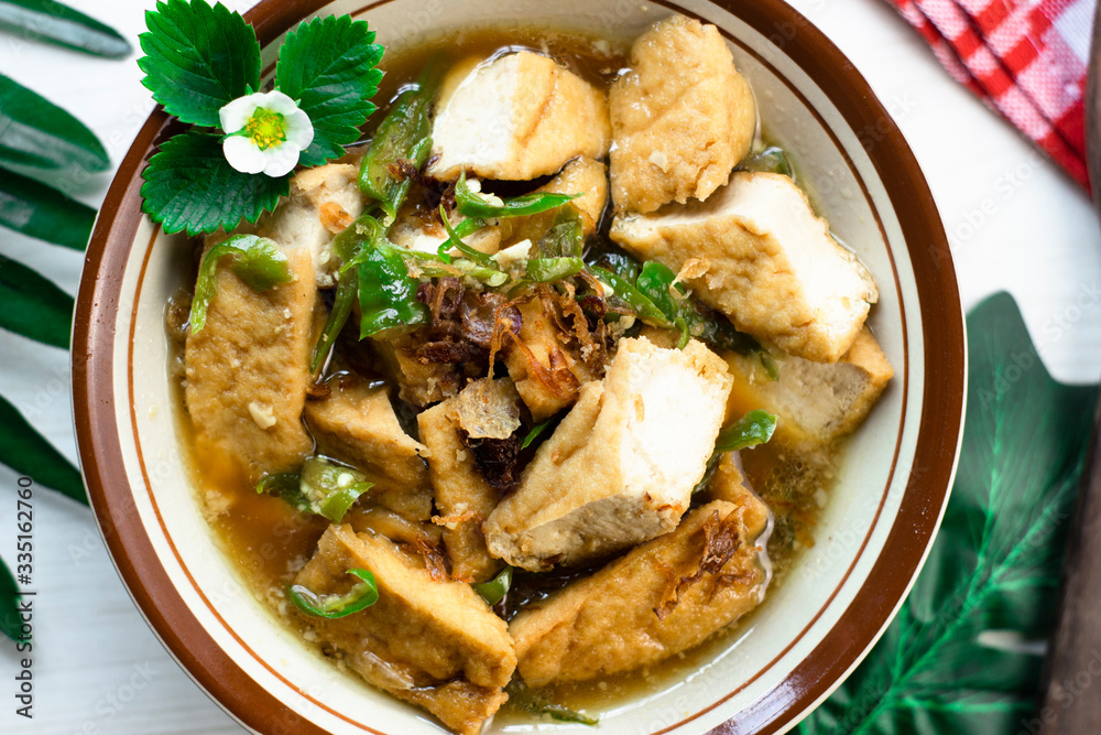 Indonesian cooked tofu with sesame seeds and spices Indonesian cooked tofu with sesame seeds and spices