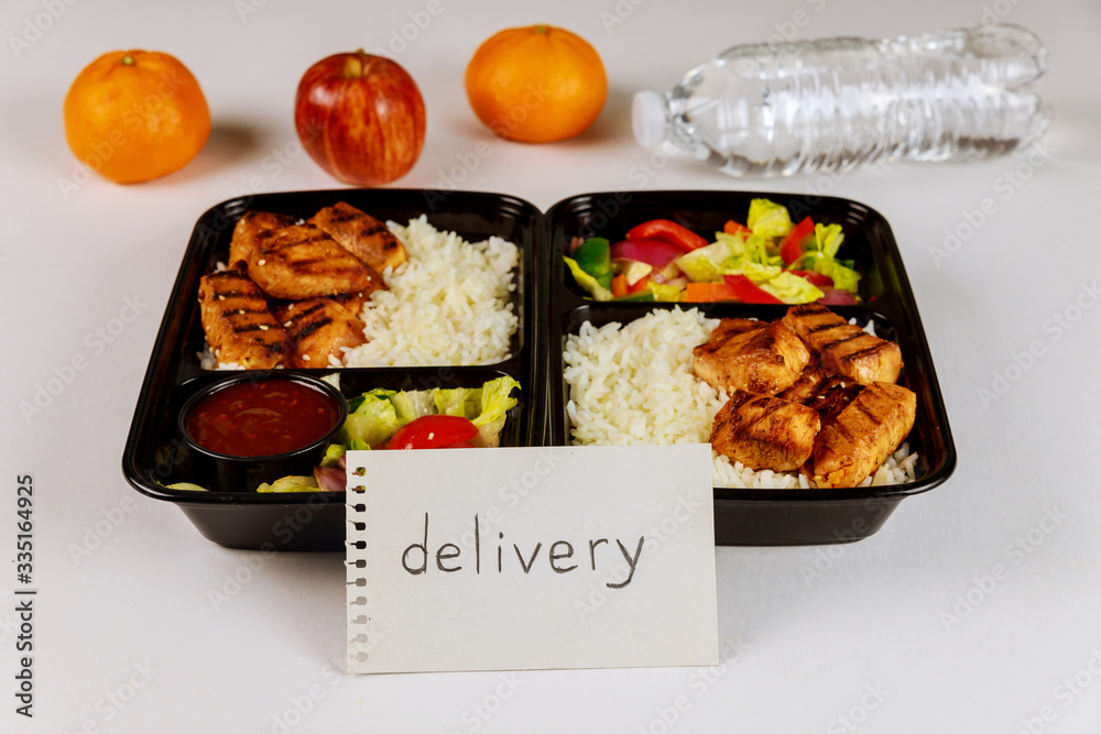 Healthy food delivery or take away lunch in container. Healthy food delivery or take away lunch in container.