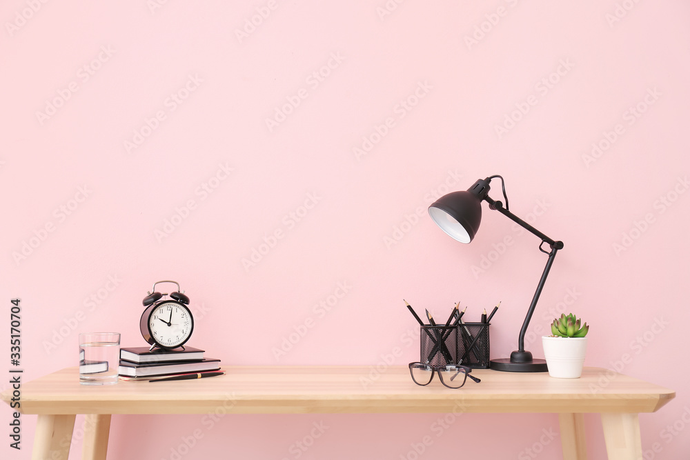 Modern stylish workplace near color wall - obrazy, fototapety, plakaty 